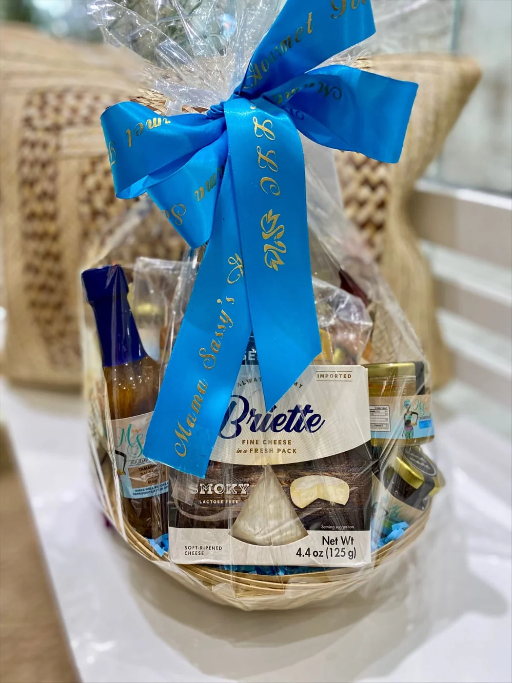 Mama Sassy gourmet gift basket finished with a blue ribbon